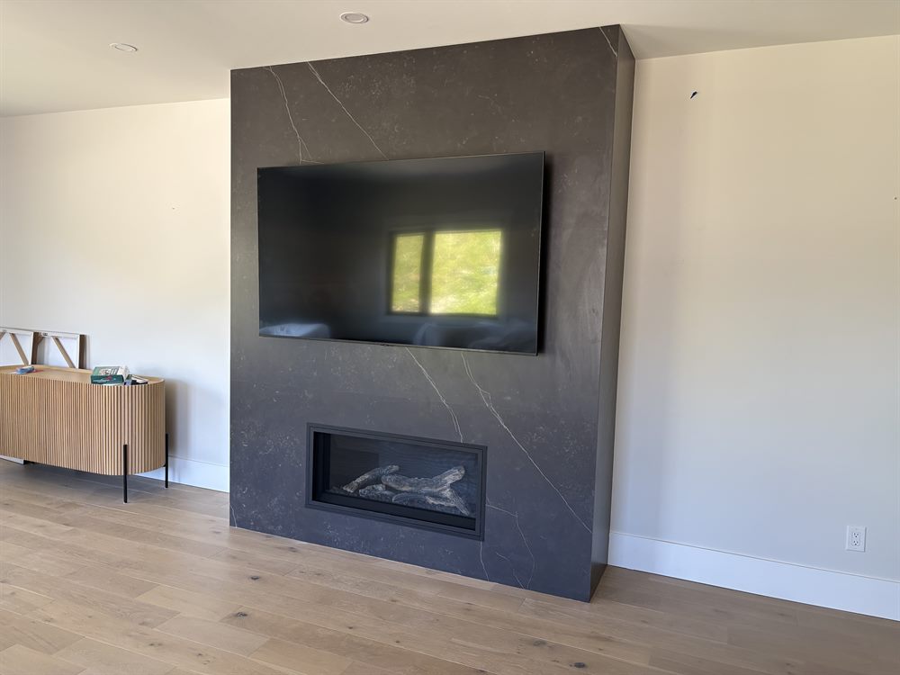 Modern fireplace installation inside a finished room